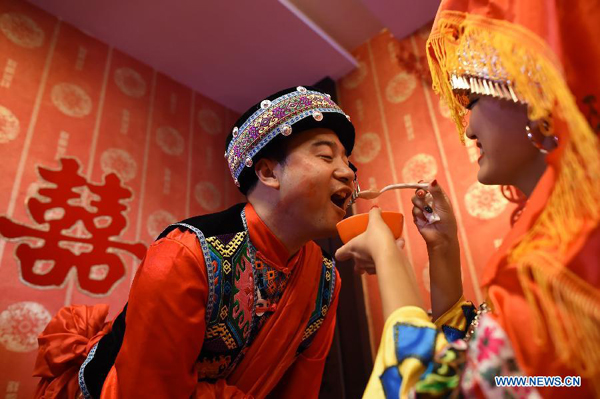 Young Miao couple get married in traditional way