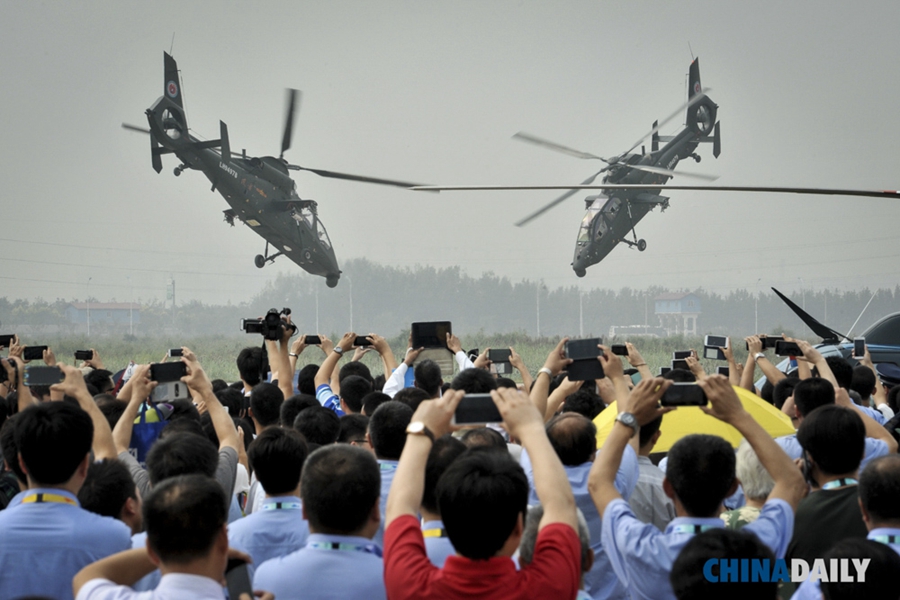 China Daily Pictures of the year 2015: Triumphs, tragedies & life's little moments