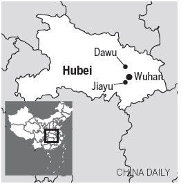 Hubei residents, facing floods, race against time