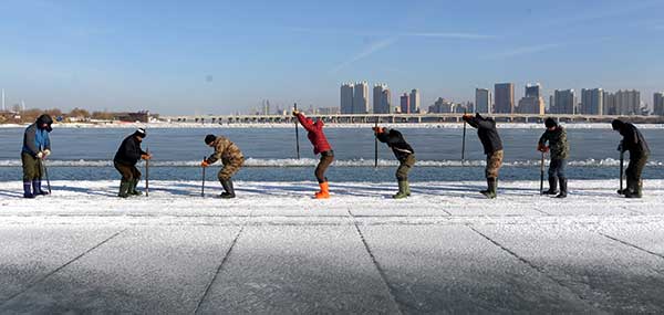 Cutting ice for a festival of sculpture