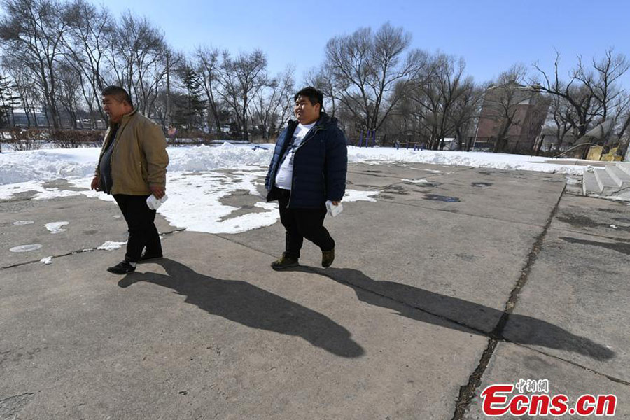 Father and son unite in war against weight