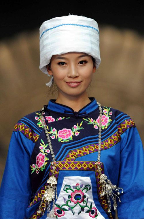 A headdress and neck accessories from the Dong ethnic group are part of a fashion show in Southwest China’s Guizhou province, on Sept 9, 2011. Ethnic style showcased in Guizhou