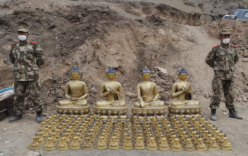 Officials assess damage to historic sites in quake zone