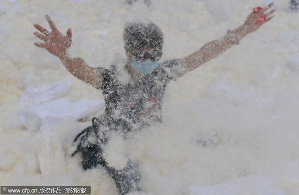 Feathers fly as pillow fight relieves stress of daily life