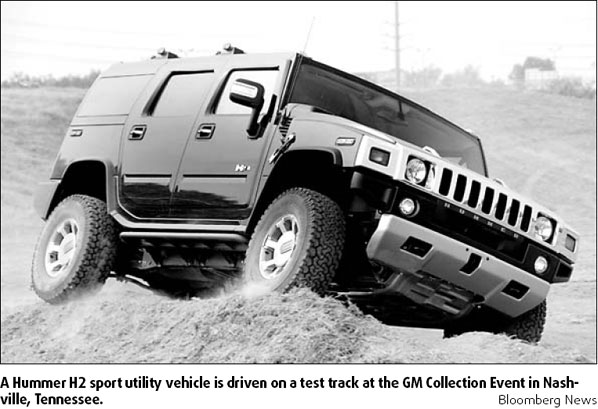 GM may cut SUV, pickup output