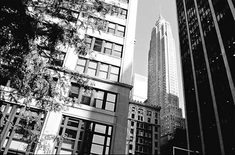 AIG seeks capital, considers selling units for funds