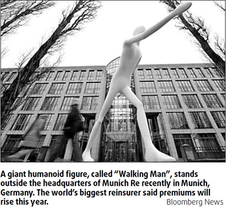 Reinsurer Munich Re eyes hike in premiums as business booms