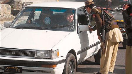 Pakistan police: Bomber rammed US soldiers' car