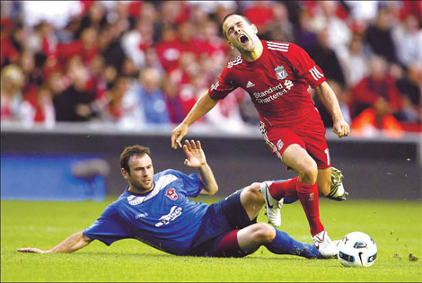 Liverpool in control on field but buyers jostle