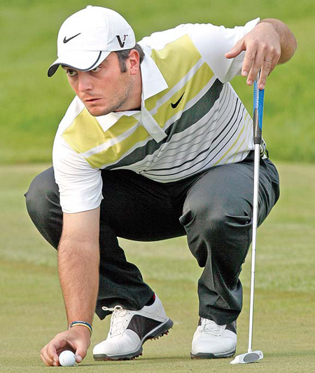 Molinari leads in Shanghai