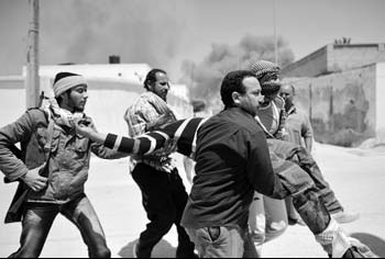 Gadhafi offers truce as NATO strikes Tripoli