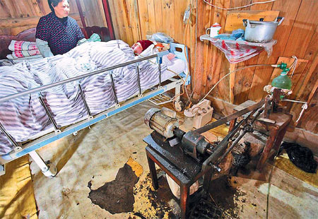 Parents work round the clock to keep son alive with ventilator