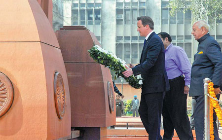 Cameron voices regret for massacre