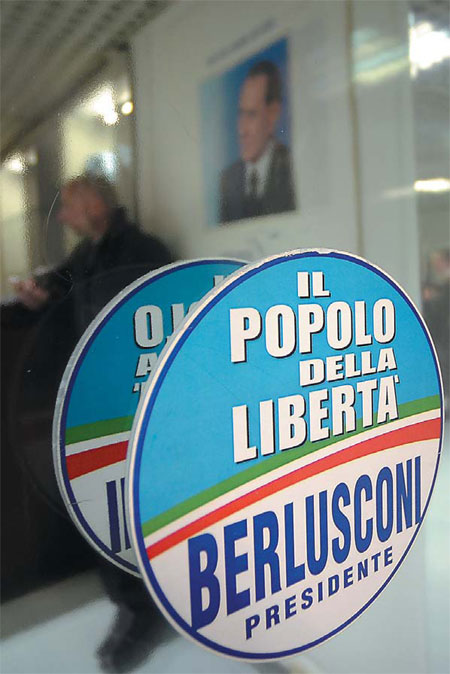 Berlusconi hints at talks of alliance with center-left