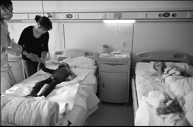 Brothers burned by boy while copying TV scene