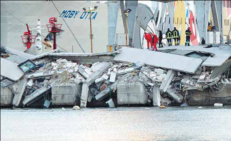 Italy cargo ship slams into Genoa port, kills 4