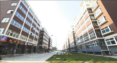 Henan Special: Farmers find better life in newly built planned communities