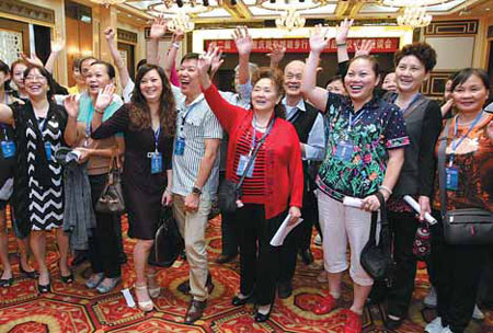 Couples tie knot across Straits