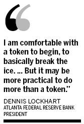 Fed's Lockhart 'comfortable' with cautious bond taper in September