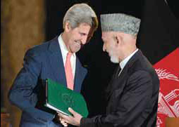 Kerry, Karzai agree to pact on troops