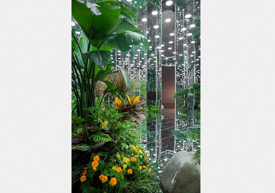 Artist uses mirrors to show lines blurring between real and virtual