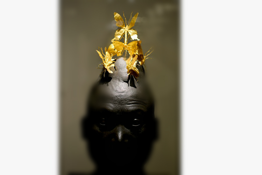 Gold and wood insects fly in Beijing's museum