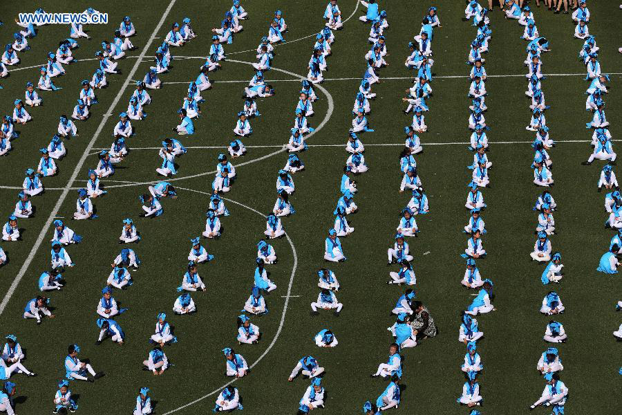 New first-graders attend traditional education activity in E China