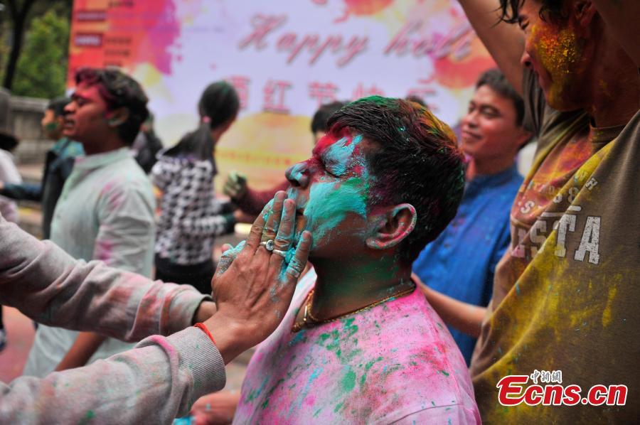 Chinese and Indians celebrate Holi