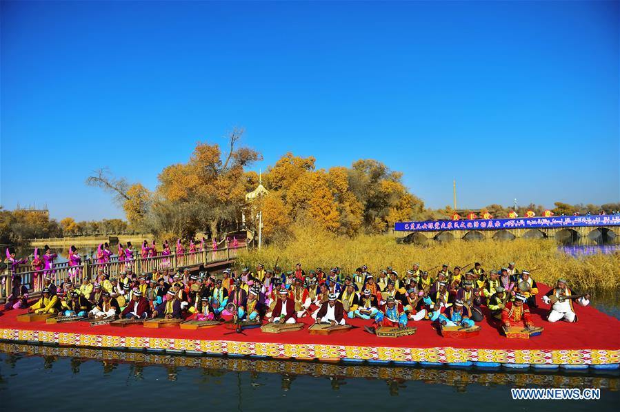 Uygur ethnic artists perform Daolang Mukam in NW China's Xinjiang
