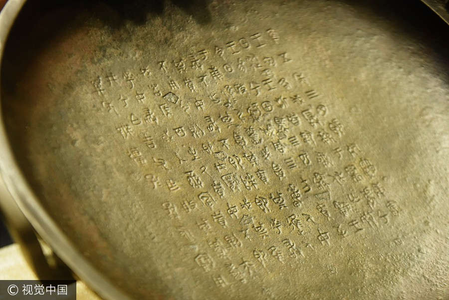 Ancient bronze plate breaks auction record