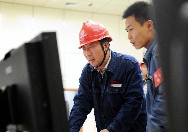 尤天軍:26年執(zhí)著堅(jiān)守 苦修成“工人教授”