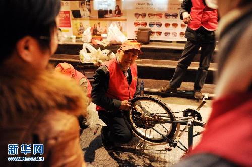 一個義務修車師傅26年的風雨堅守