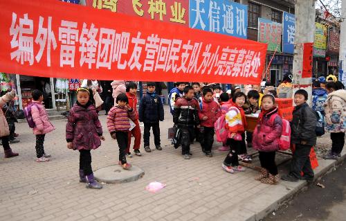 “編外雷鋒團”:一座豫南小城的雷鋒印