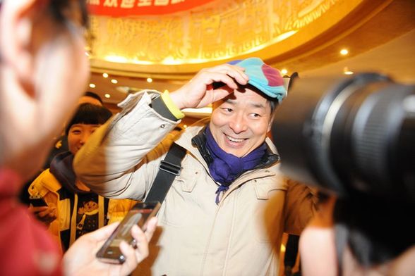 iPhone受寵！看看兩會記者的采訪工具