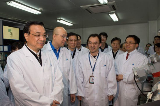 李克強在江蘇上?？疾? style=