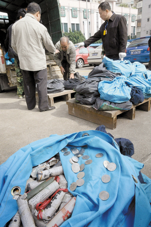 佛山公交5年收假幣過百萬 如何防假幣難倒公交公司