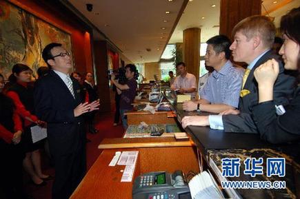 重慶警方同意希爾頓酒店29日起試營業(yè)