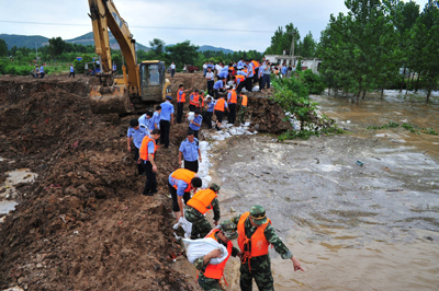 河南淅川縣：眾志成城抗洪災(組圖)