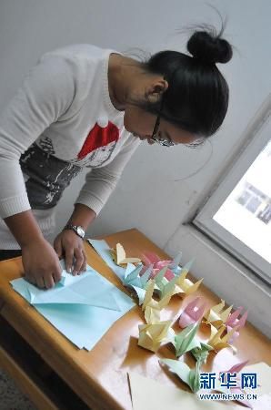 揚州大學大學生收廢品資助學童引網民熱捧