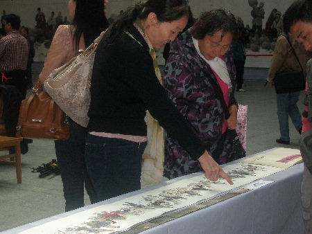 龍清廉《和田一條街》美術(shù)展在烏魯木齊舉行