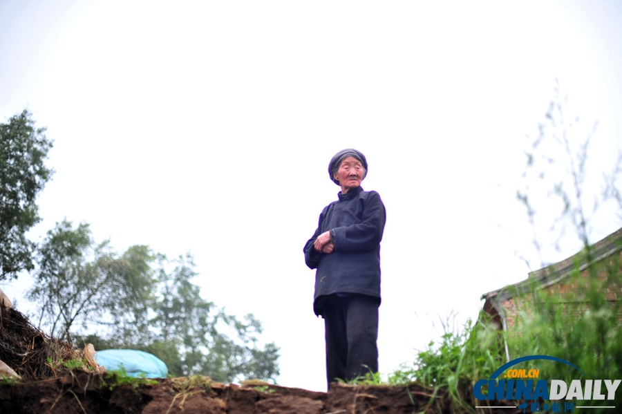 震區(qū)表情：甘肅定西6.6級地震災(zāi)后見聞