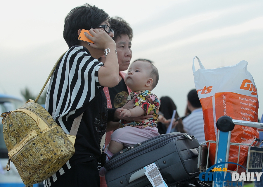 “海娜號”郵輪滯留韓國游客陸續抵達北京