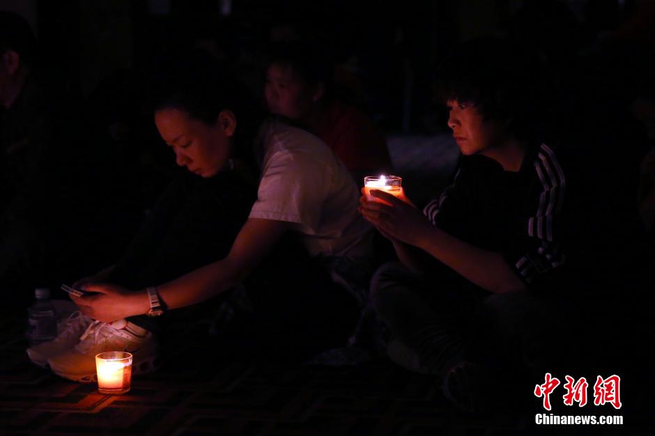 MH370航班失聯滿月 在京乘客家屬舉行祈福活動