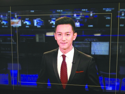 80后坐上《北京新聞》主播臺