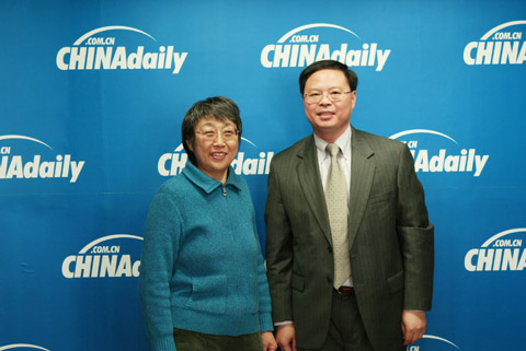 張劍飛與中國日報常務副總編輯黃慶