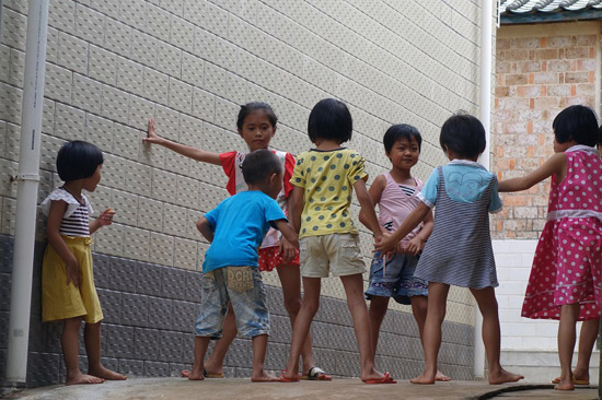 海口龍鱗村村民生活越過越紅火