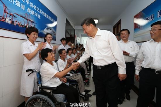 習近平：全面建成小康社會，殘疾人一個也不能少