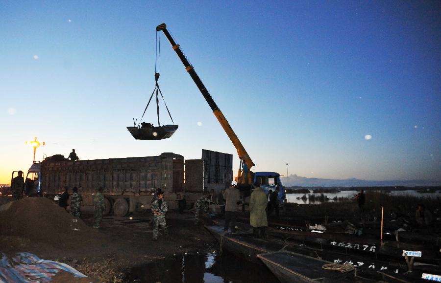 撫遠組織百艘漁船支援同江抗洪