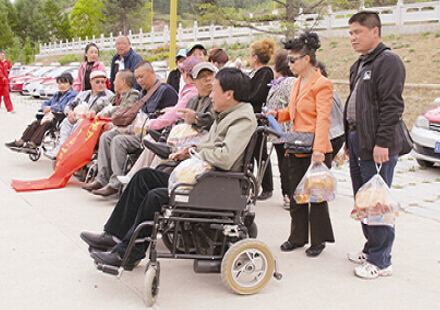 本溪：黨員誠信車隊堅持愛心助殘13年（圖）