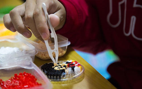 自閉癥日讓愛溫暖孤獨 星星的孩子不再孤單|圖